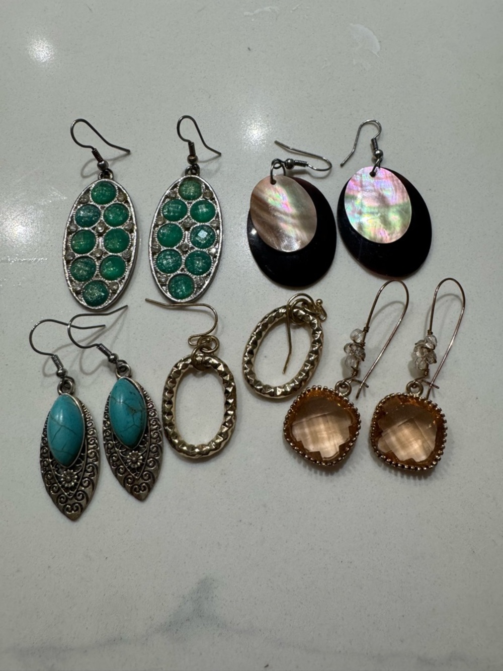 Assorted Women's Dangle Earrings - Five pairs of earrings.